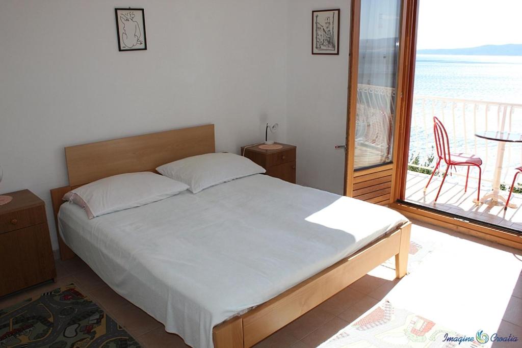Posteľ alebo postele v izbe v ubytovaní Apartment in Pisak with sea view, balcony, air conditioning, Wi-Fi (4722-4)
