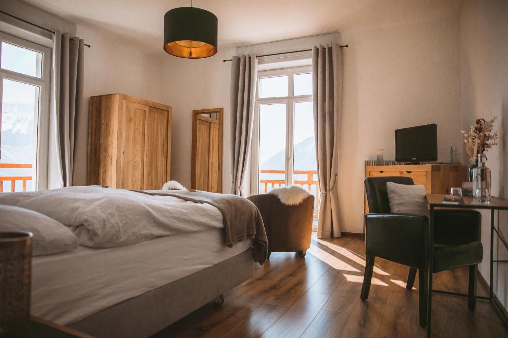 Postel nebo postele na pokoji v ubytování Hotel Splendide