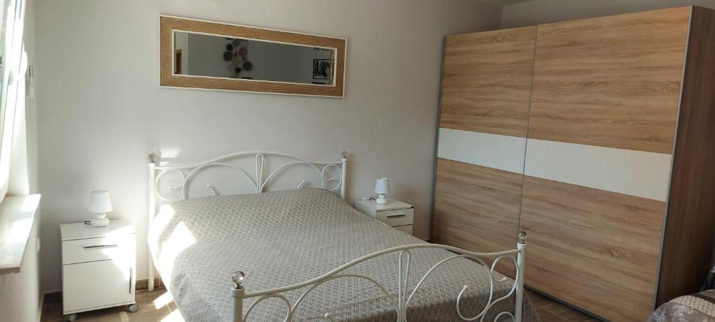 Postel nebo postele na pokoji v ubytování Studio Apartment Palmira