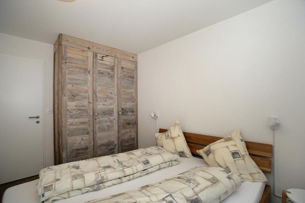 Postel nebo postele na pokoji v ubytování Baron / Baronesse Apartments