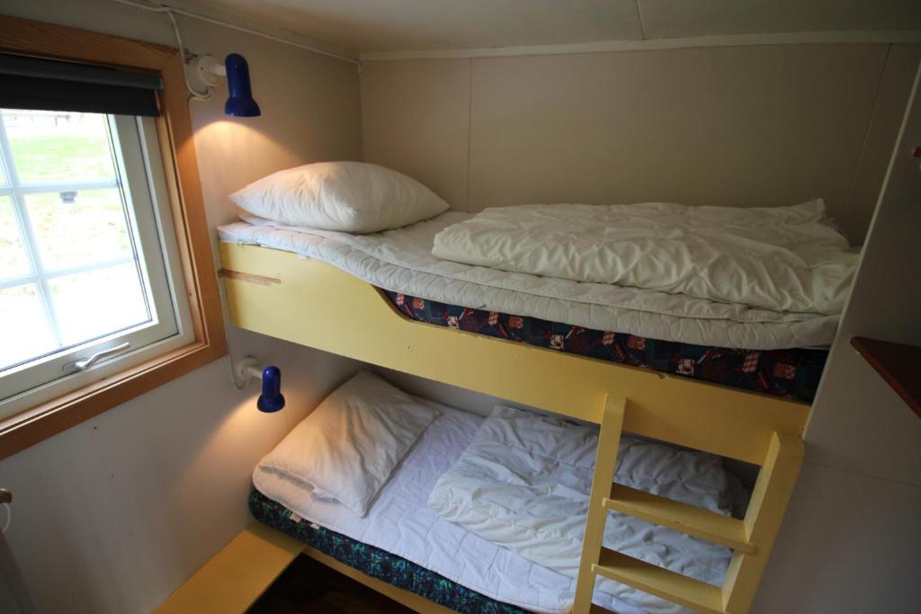 Postel nebo postele na pokoji v ubytování Gjerdset Turistsenter