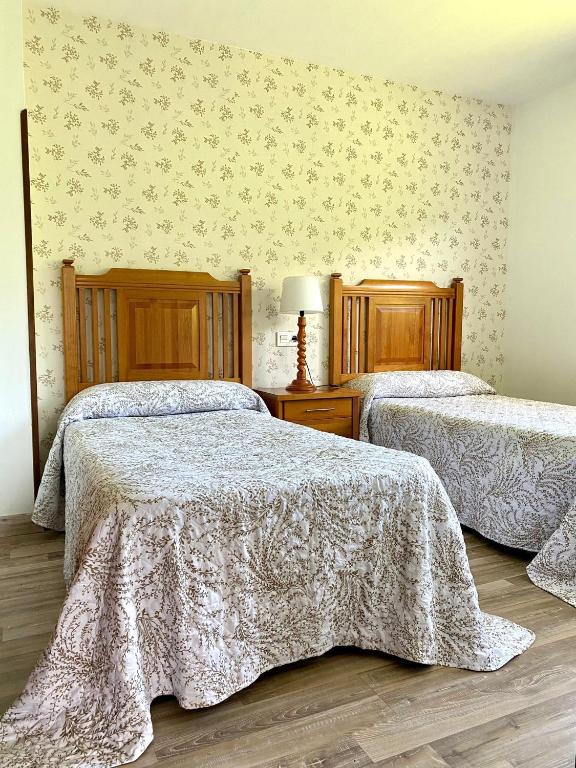 Postel nebo postele na pokoji v ubytování Finca La Cuesta
