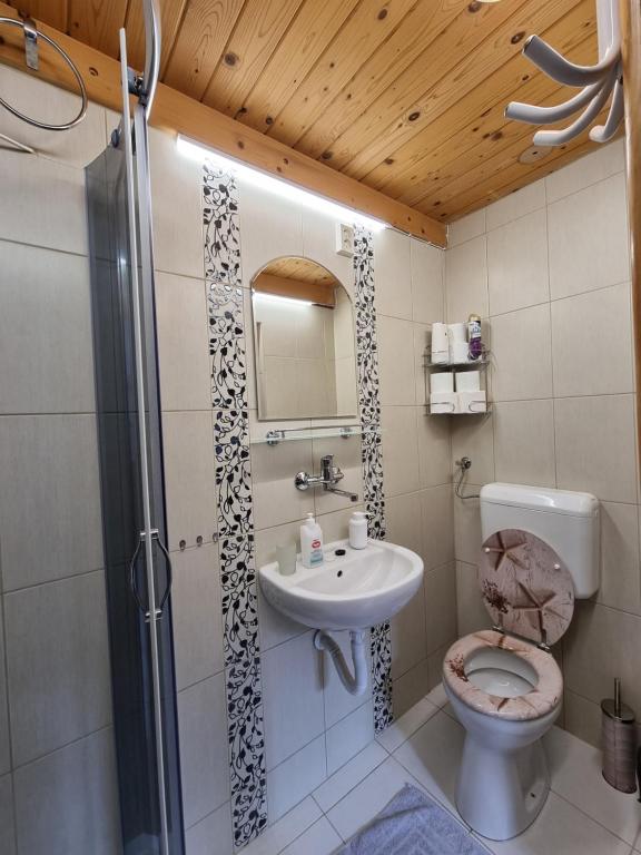 Koupelna v ubytování Little Cozy Apartman
