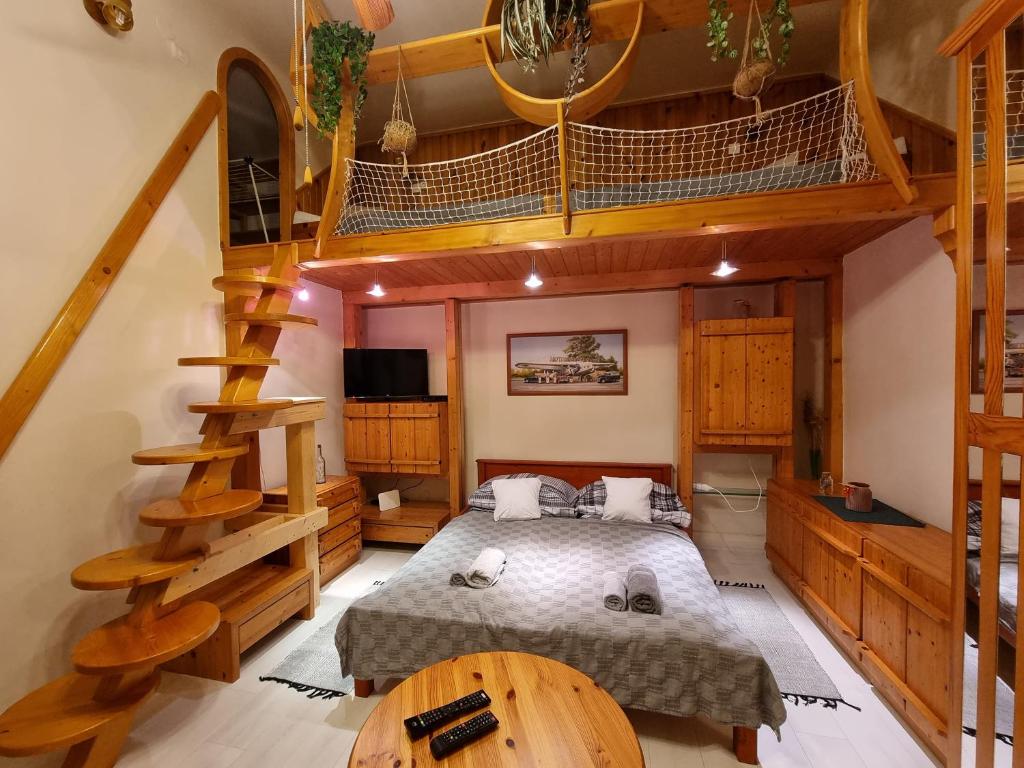 TV a/nebo společenská místnost v ubytování Little Cozy Apartman
