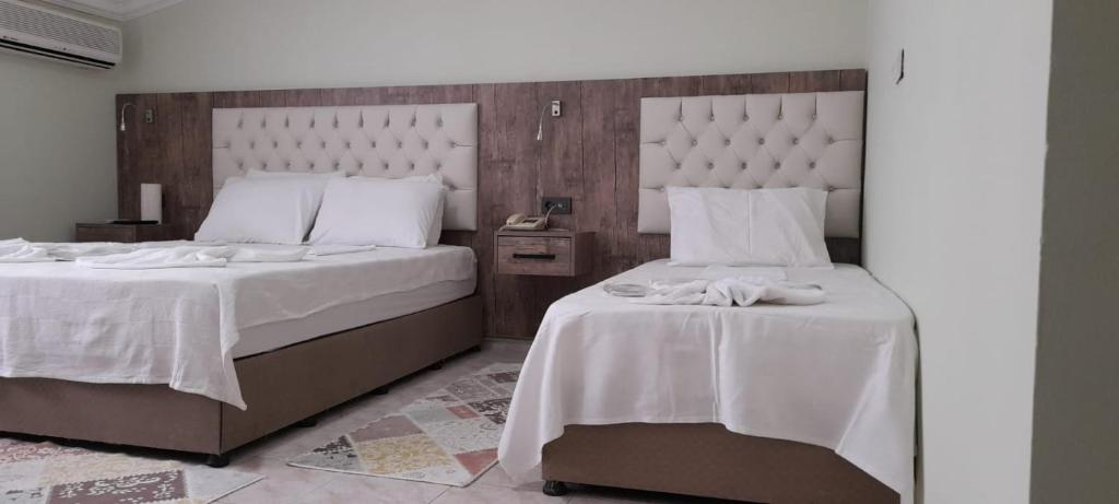 Postel nebo postele na pokoji v ubytování Hotel Villa Granada
