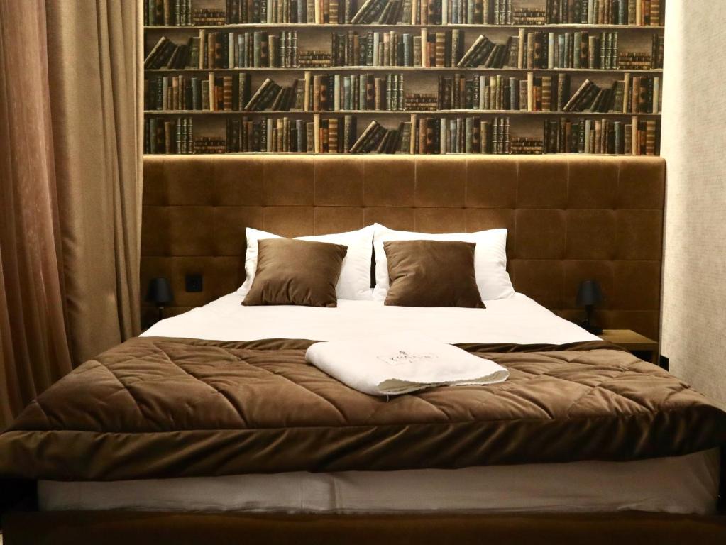 Postel nebo postele na pokoji v ubytování Kuprin Hotel