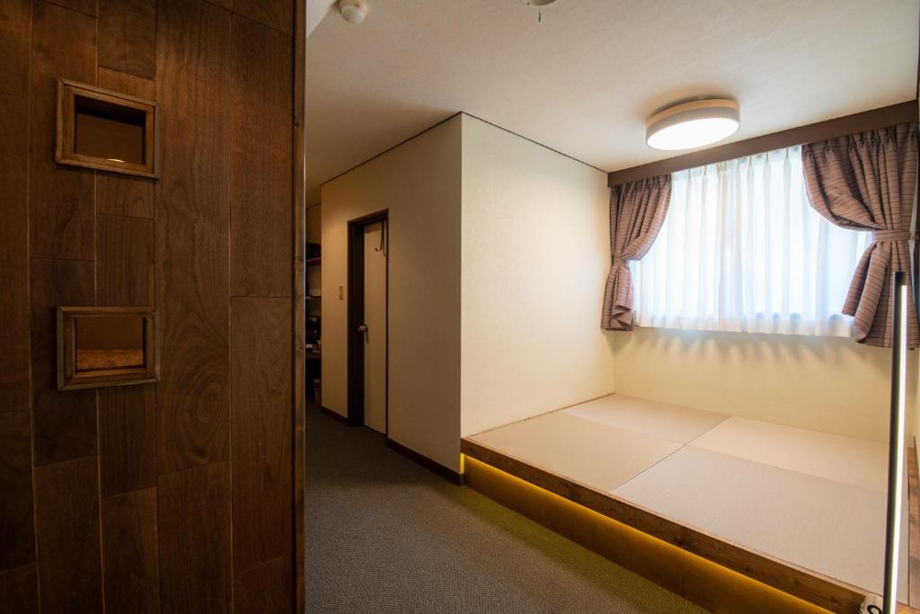 Postel nebo postele na pokoji v ubytování Hotel Haus St Anton