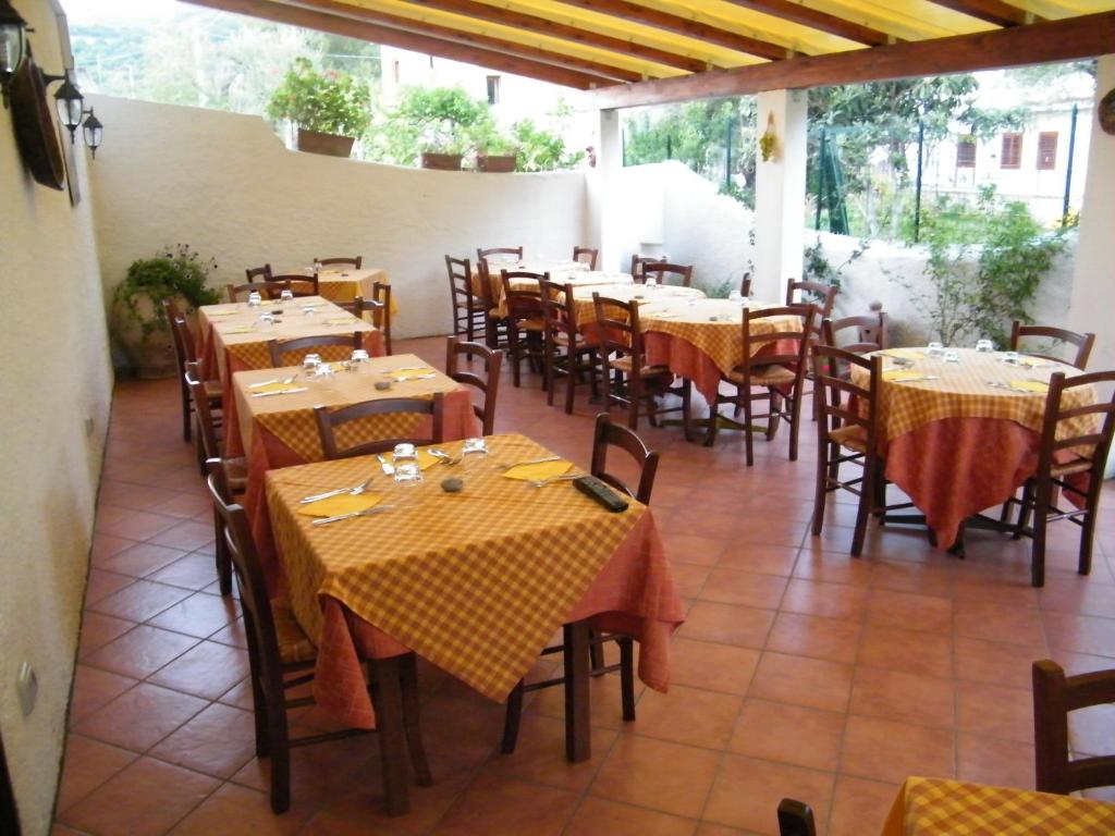 Restaurace v ubytování Hotel Villaggio Tabù