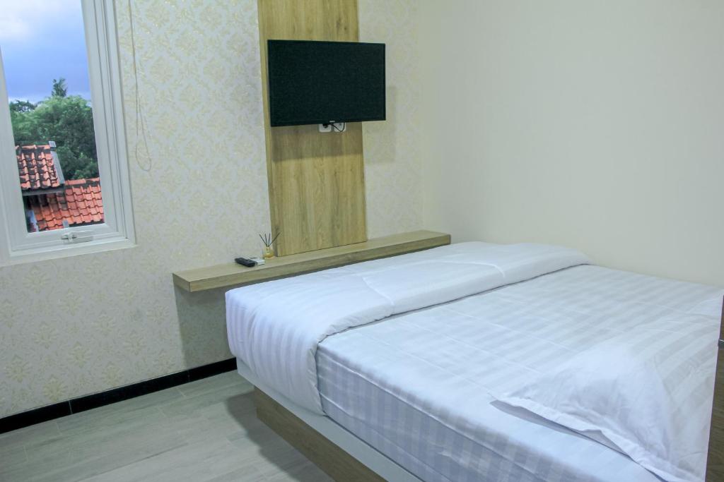 Postel nebo postele na pokoji v ubytování CASAKITA exclusive guest house