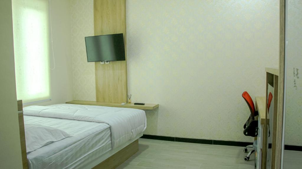Postel nebo postele na pokoji v ubytování CASAKITA exclusive guest house