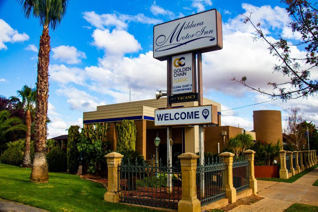 a welcome sign in front of a building at Mildura Motor Inn in Mildura