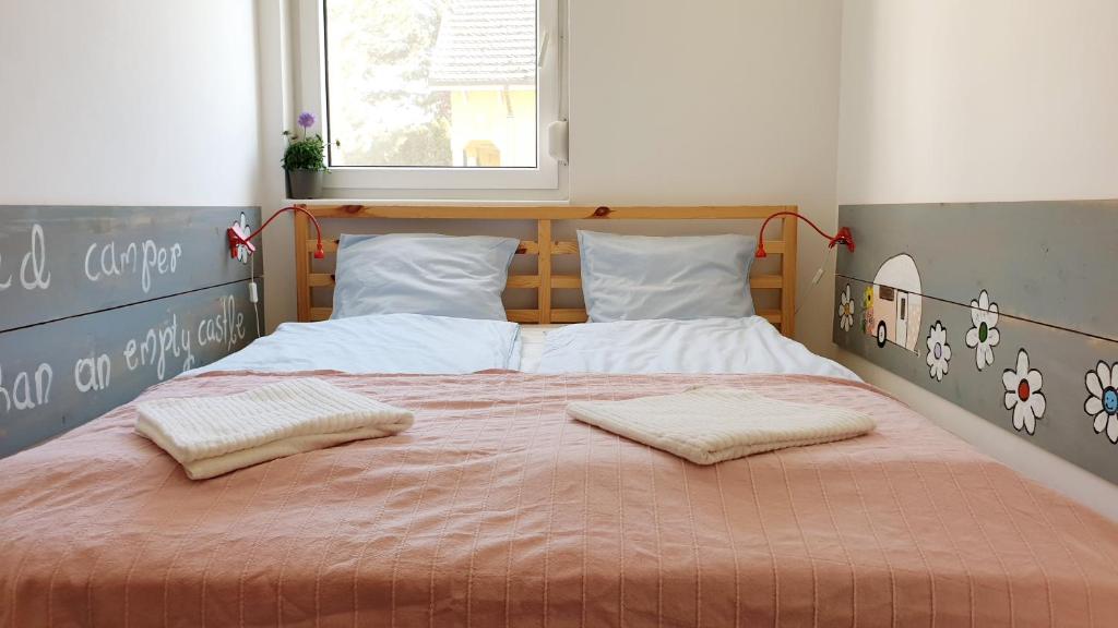 Posteľ alebo postele v izbe v ubytovaní MiLa Home Zamardi - Keszeg