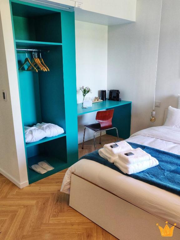 Postel nebo postele na pokoji v ubytování Estafête