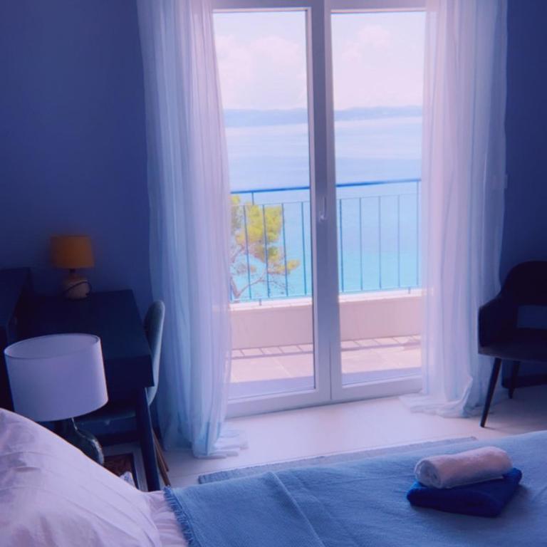 Posteľ alebo postele v izbe v ubytovaní Hotel Elu Iris