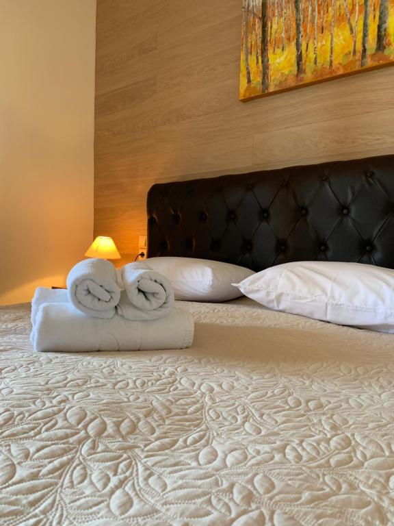 Postel nebo postele na pokoji v ubytování Elena-Pelagia Villas