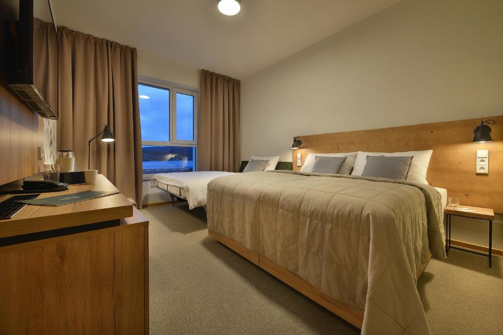 Postel nebo postele na pokoji v ubytování Hotel Element