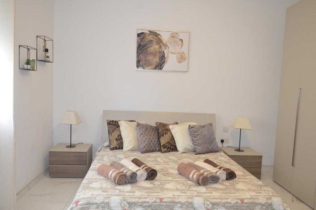 Postel nebo postele na pokoji v ubytování Lorenza Letting Apartment