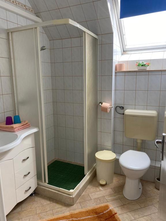 Kúpeľňa v ubytovaní Arany Apartman
