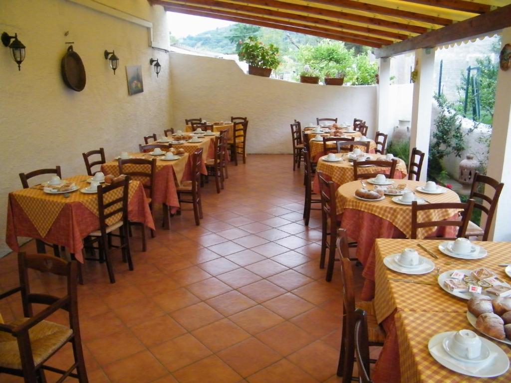 Restaurace v ubytování Hotel Villaggio Tabù