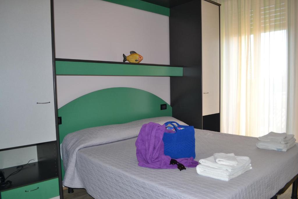 Postel nebo postele na pokoji v ubytování Hotel Tre Stelle