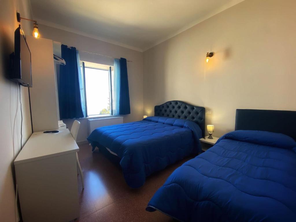 Postel nebo postele na pokoji v ubytování Porto Salvo