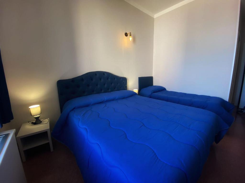 Postel nebo postele na pokoji v ubytování Porto Salvo