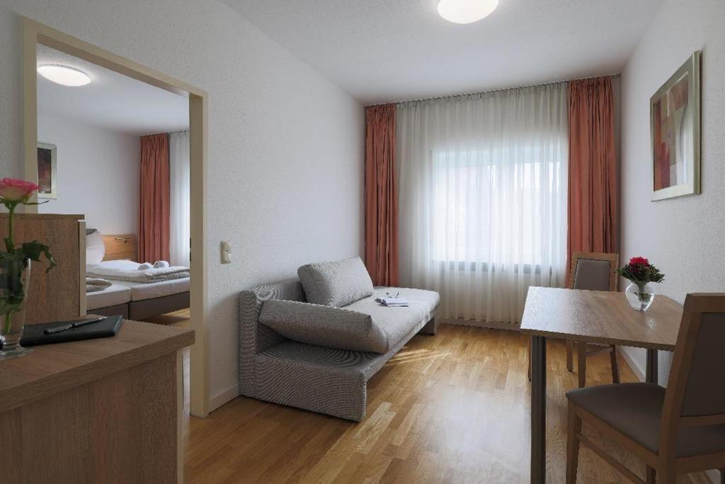 Posezení v ubytování Edelweiß - Appartements & Café