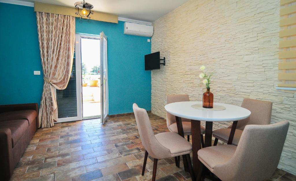 TV a/nebo společenská místnost v ubytování Pontus Luxury Apartments