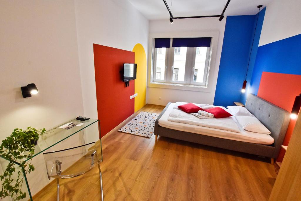 Postel nebo postele na pokoji v ubytování ZACHÁR APARTMAN