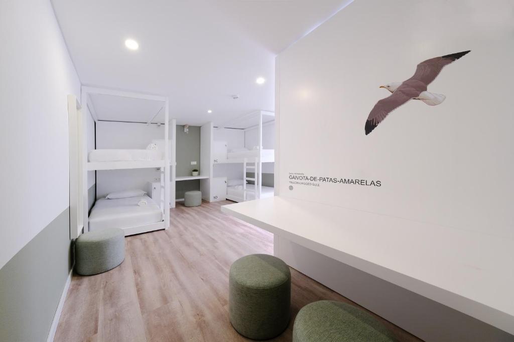 Postel nebo postele na pokoji v ubytování Boa Nova Hostel