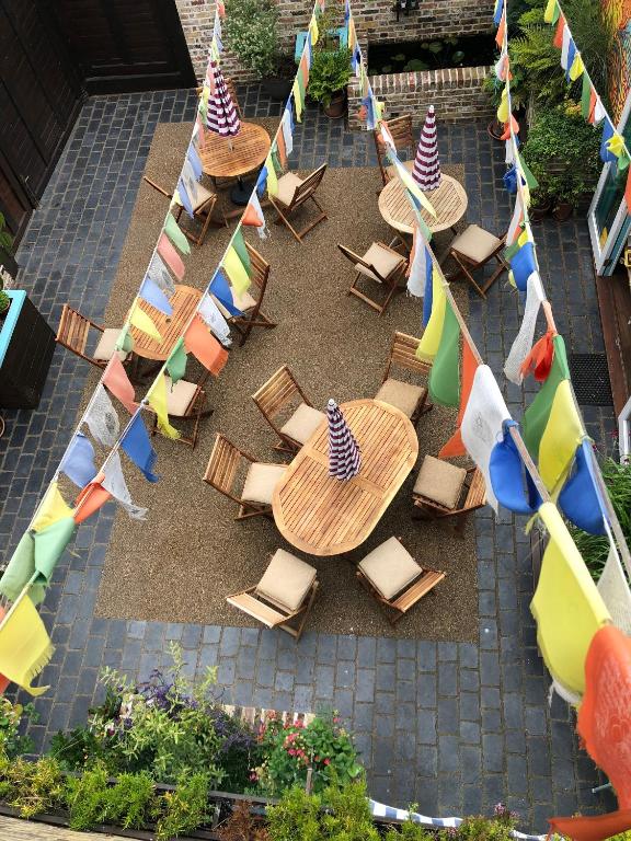 an overhead view of a patio with chairs and tables at The Beetroot in Margate