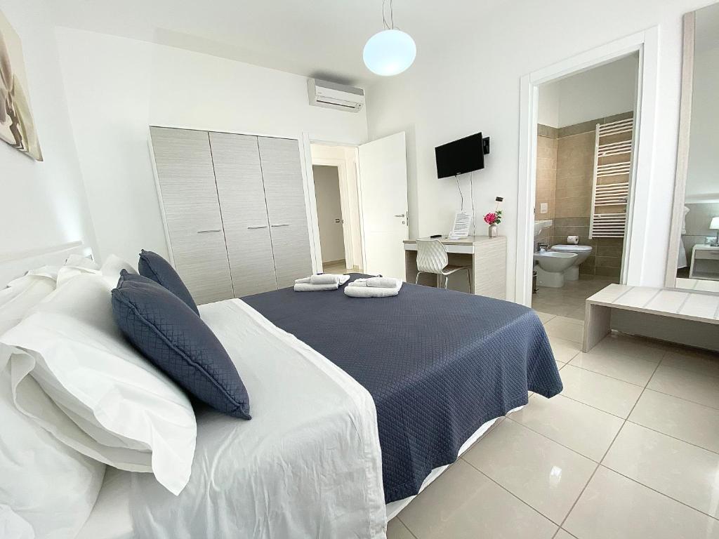 A bed or beds in a room at B&B ARFE'