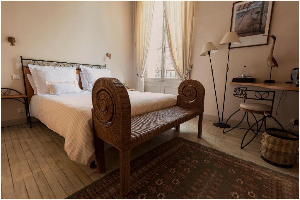 Postel nebo postele na pokoji v ubytování Hotel Le Clos Raymi