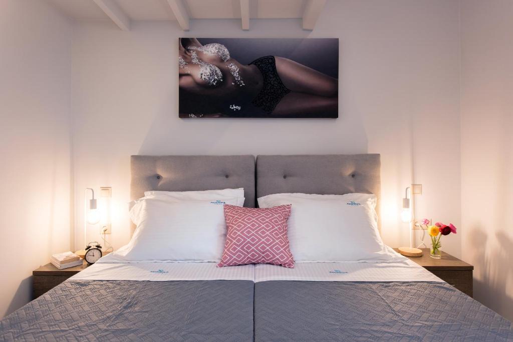 Postel nebo postele na pokoji v ubytování AD HOMES