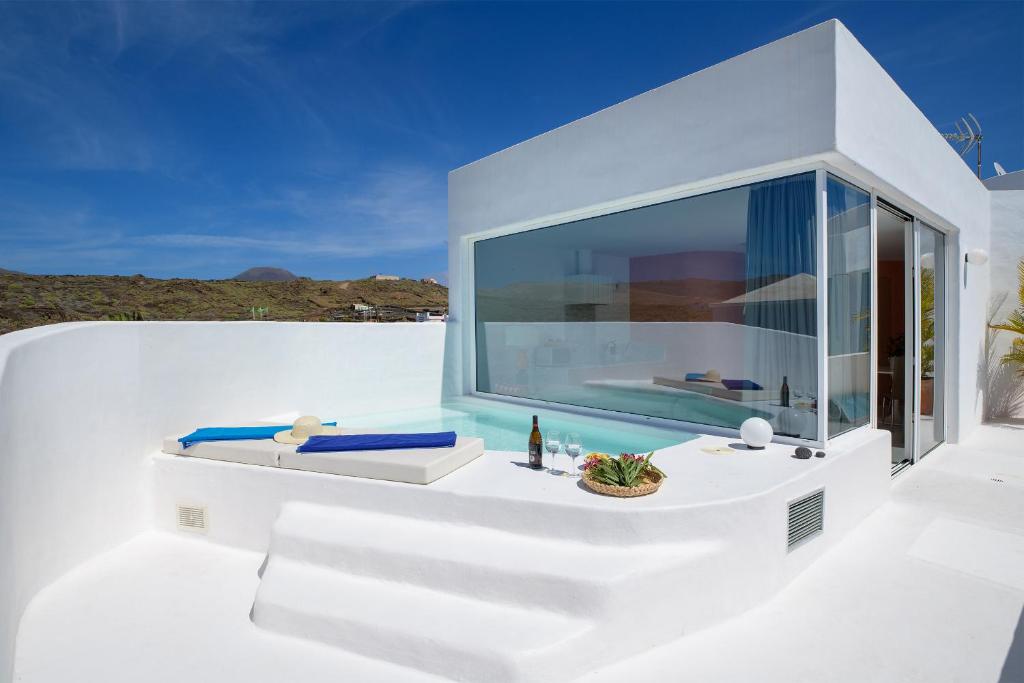 AQUABLANCA Suite Pool Deluxe en Punta Mujeres - Apartamento De Lujo