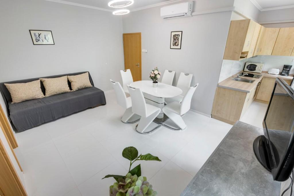 A kitchen or kitchenette at Fonyód Beach Apartment