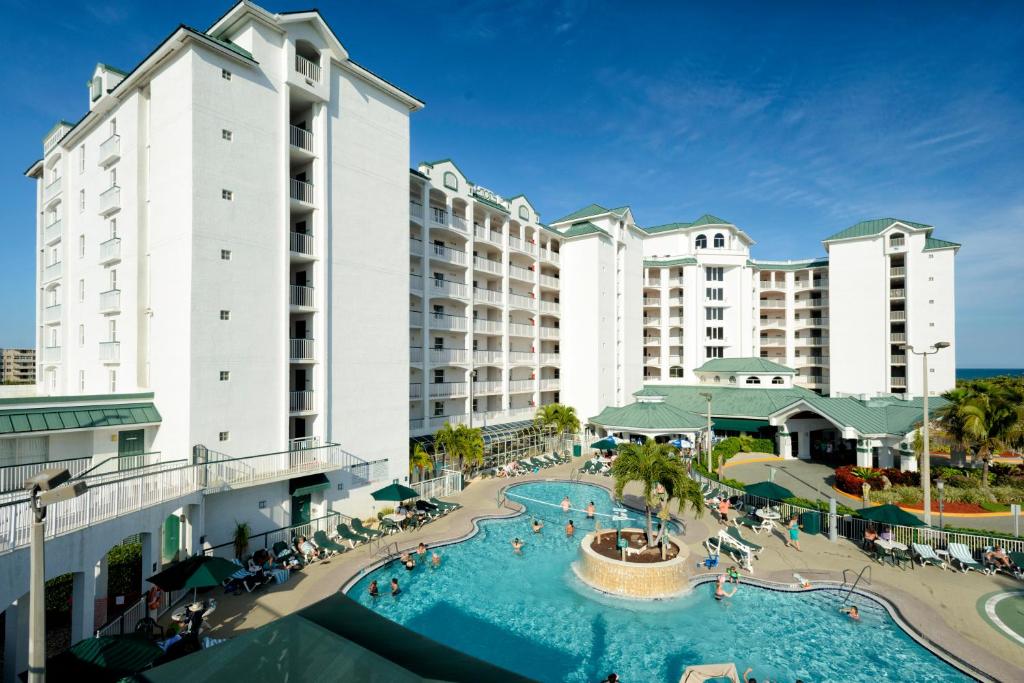a view of a resort with a swimming pool at The Resort on Cocoa Beach, a VRI resort in Cocoa Beach