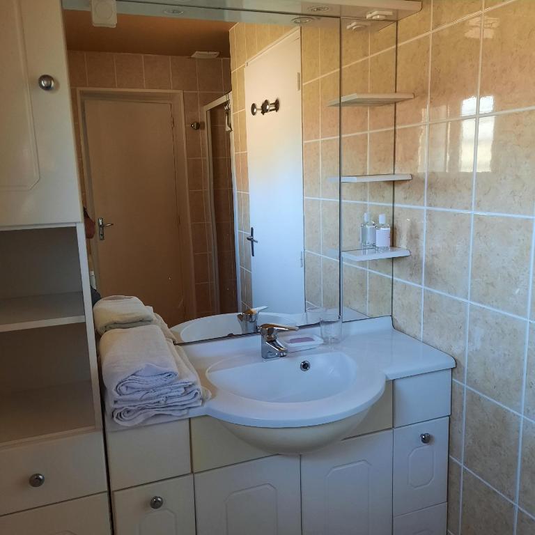 Koupelna v ubytování Chambre d'hôte Le Châtaignier