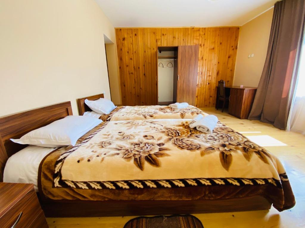 Postel nebo postele na pokoji v ubytování Guesthouse AlpenRose