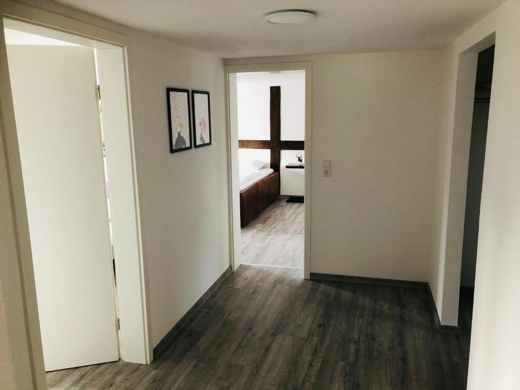 Postel nebo postele na pokoji v ubytování Ferienwohnung Waldblick