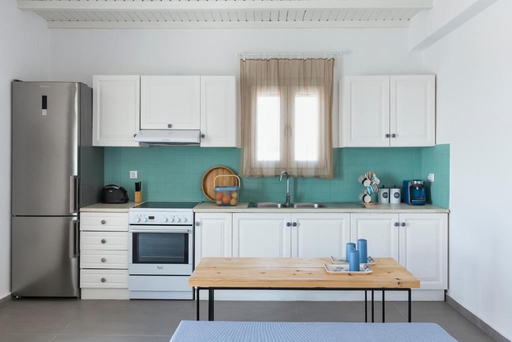 Kuchyň nebo kuchyňský kout v ubytování Amperian Mykonos Suites & Villas