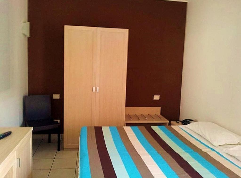 Postel nebo postele na pokoji v ubytování Hotel Bulla Regia