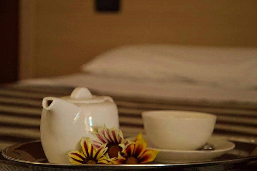 Postel nebo postele na pokoji v ubytování Hotel Bulla Regia