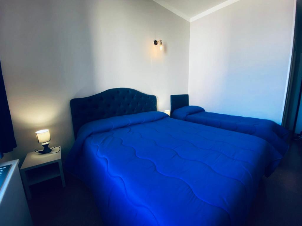 Postel nebo postele na pokoji v ubytování Porto Salvo