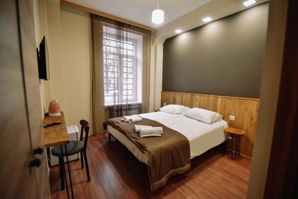 Postel nebo postele na pokoji v ubytování Lori Guest House Hotel