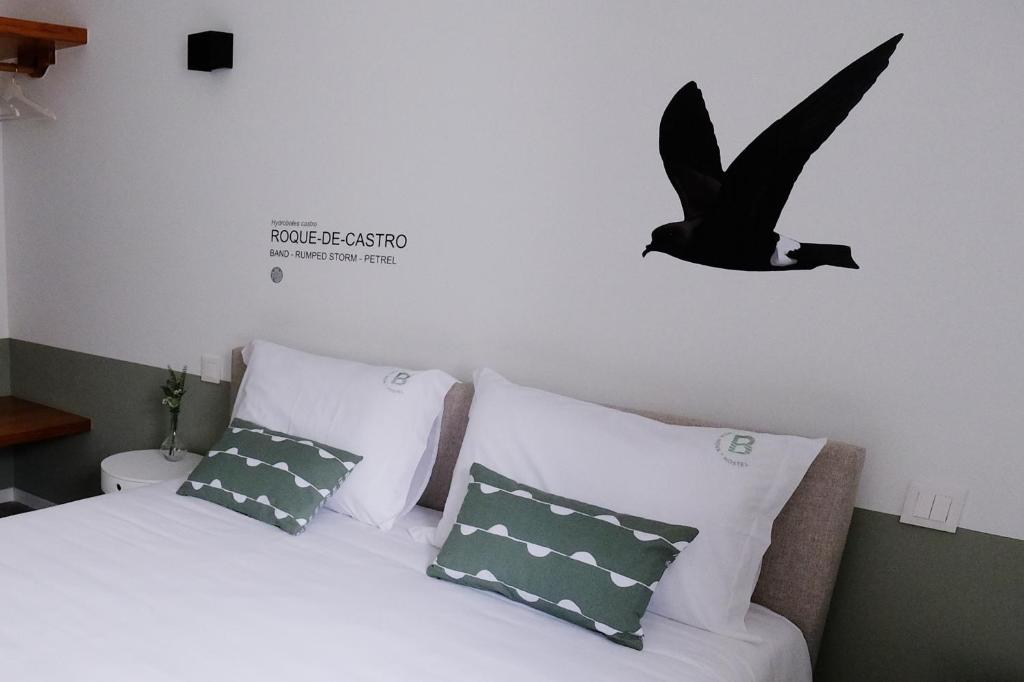 Postel nebo postele na pokoji v ubytování Boa Nova Hostel