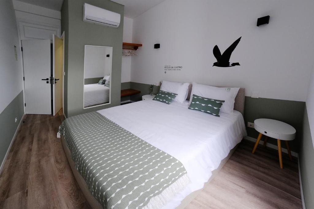 Postel nebo postele na pokoji v ubytování Boa Nova Hostel