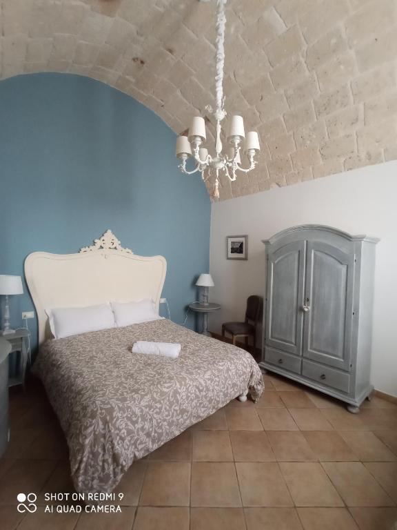 Posteľ alebo postele v izbe v ubytovaní B&B La Porta Vecchia