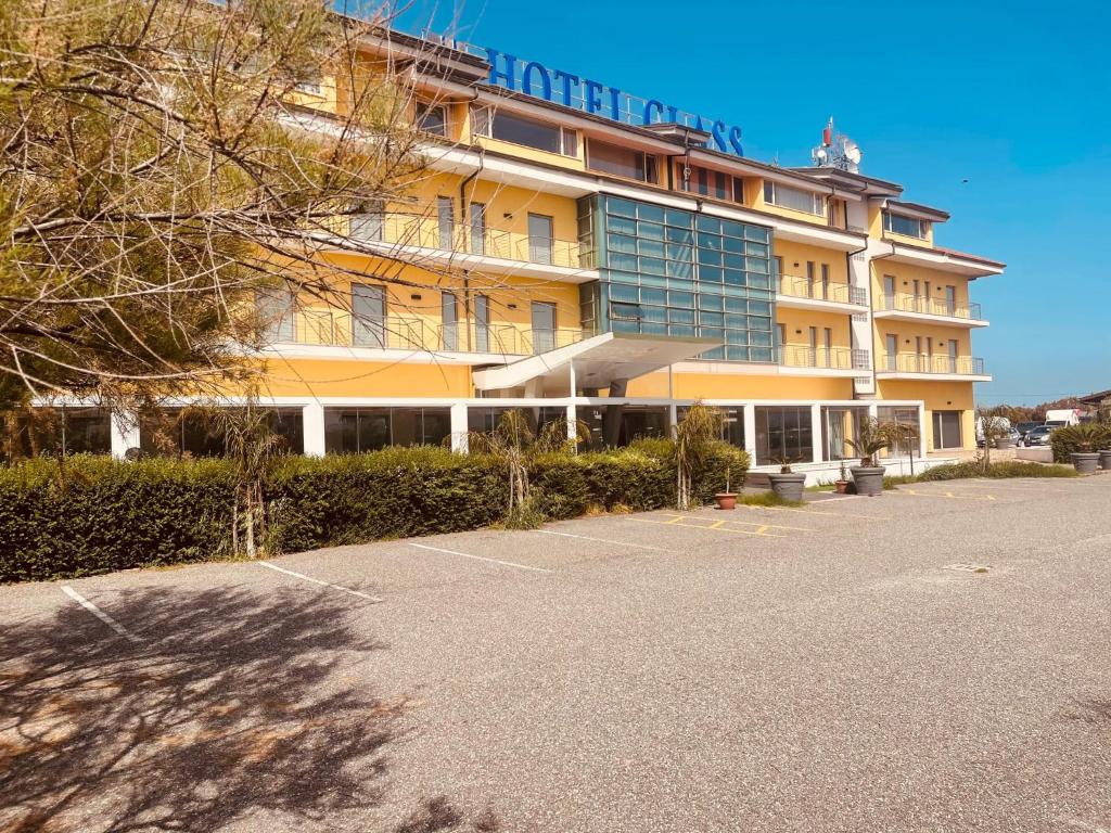 a large building with a parking lot in front of it at Best Western Hotel Class Lamezia in Lamezia Terme