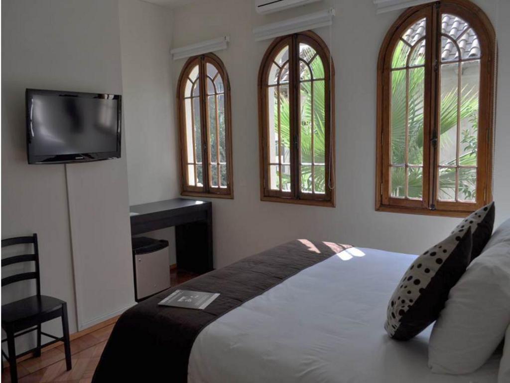 TV a/nebo společenská místnost v ubytování Hotel CasaDeTodos